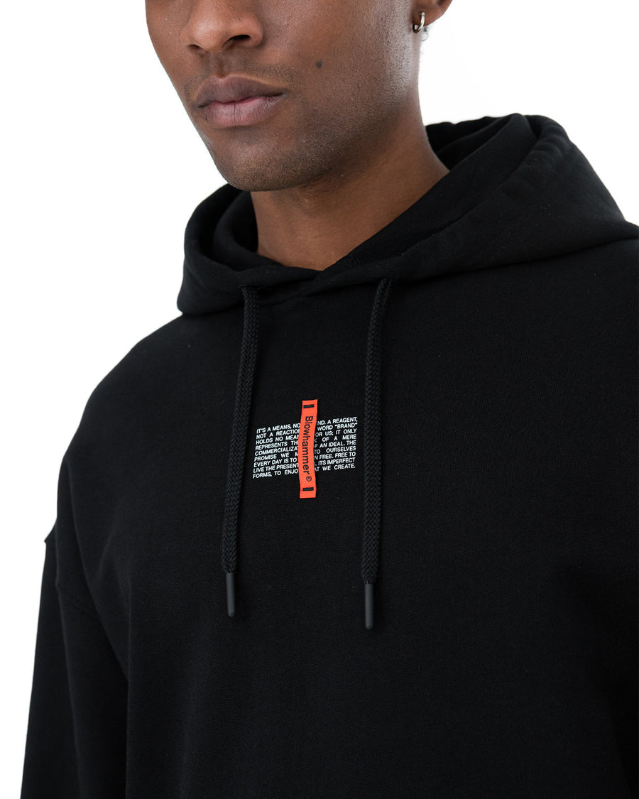 Flag hoodie in black, worn, close-up